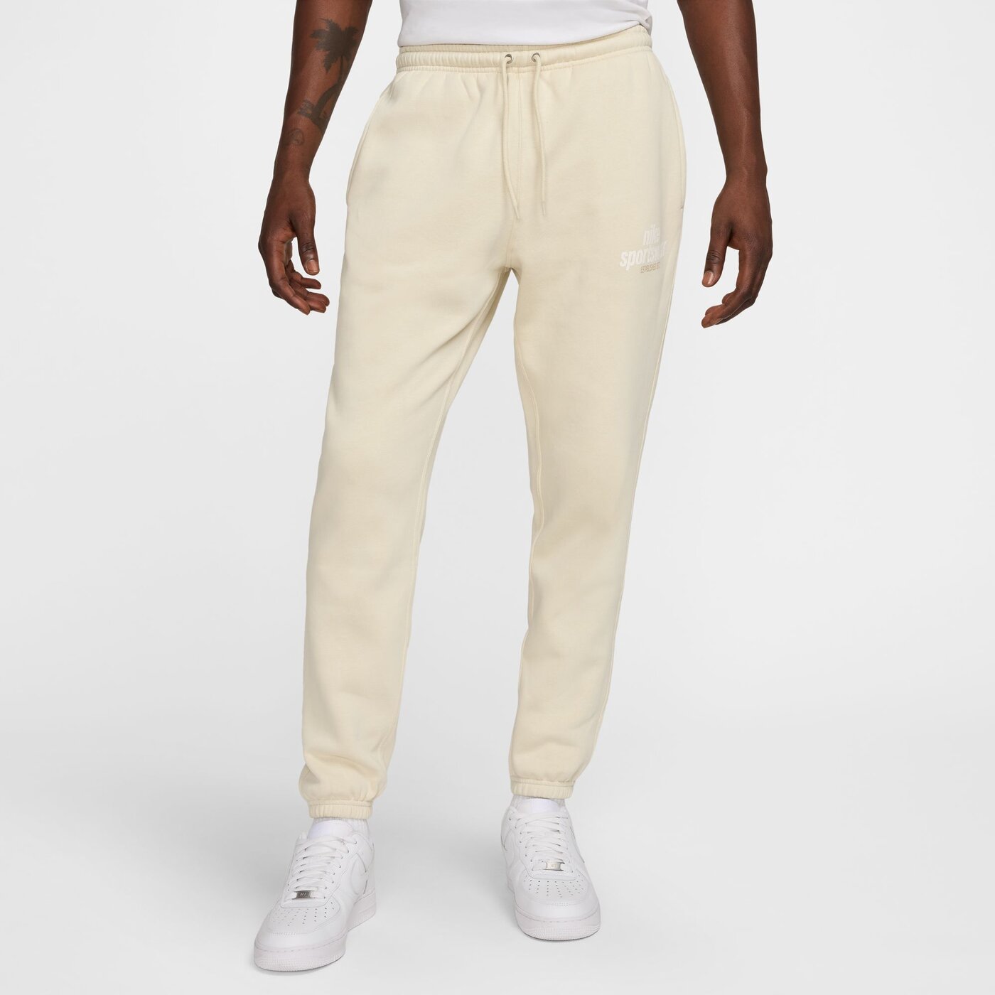 NIKE M NK CLUB BB CF PANT NSW GFX EL DORADO/ROSE GOLD